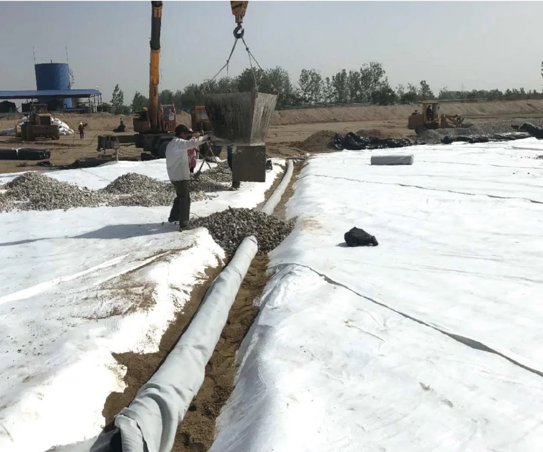 Drainage and filtration construction across prepared ground
