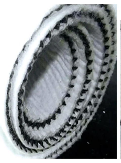 Rolled composite drainage geonet showing geotextile and plastic mesh layers