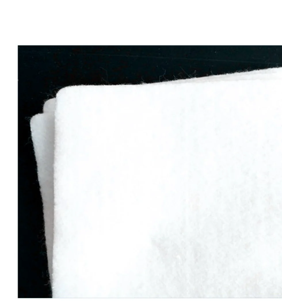 Close view of white filament needle-punched nonwoven geotextile material