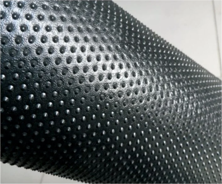 Close view of a column-point textured HDPE geomembrane surface
